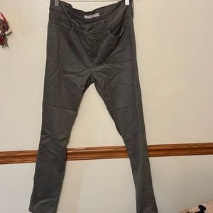 Levi’s 311. Army green size 29. Coated jean. 30 in length.